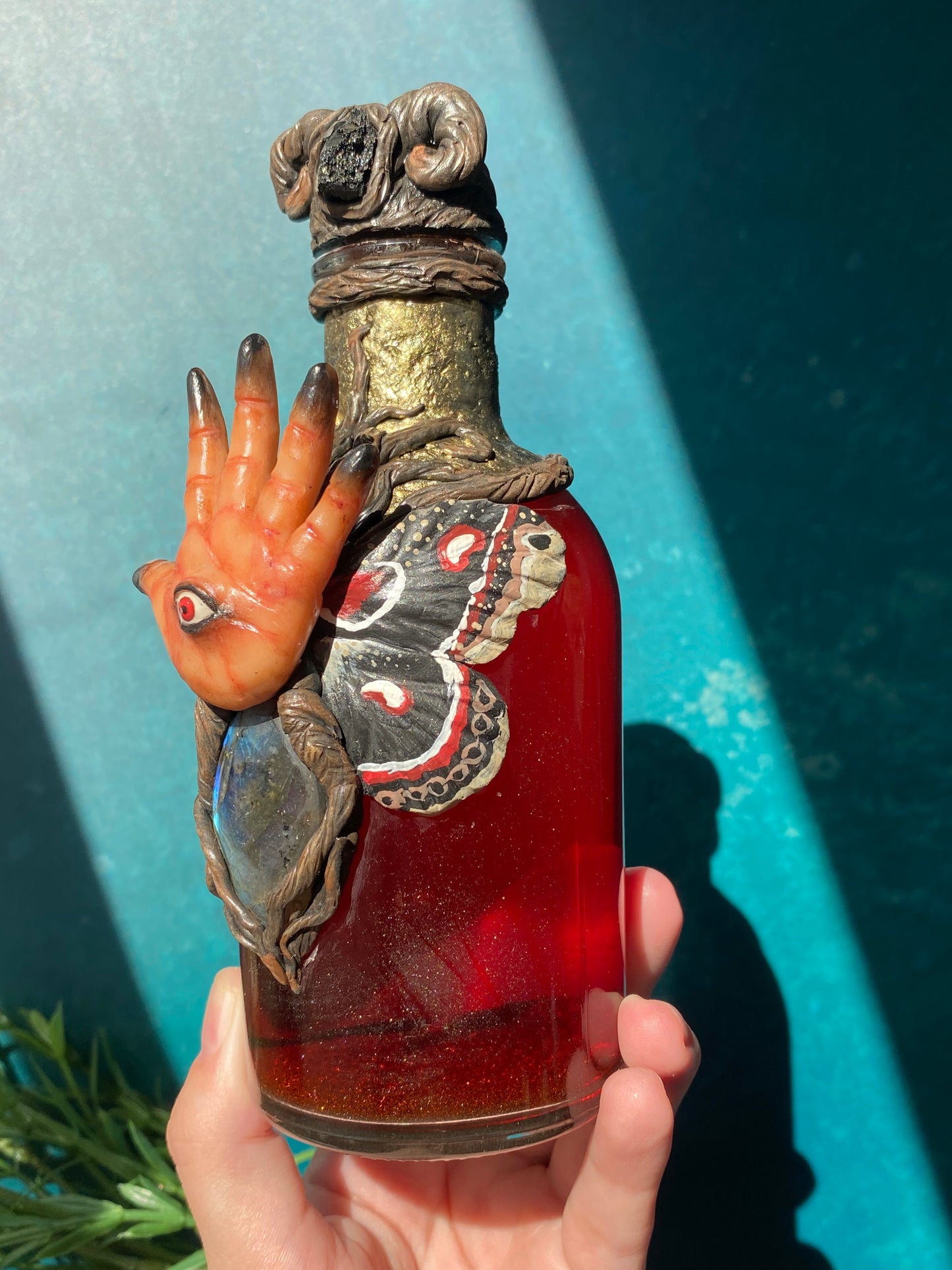 Pans Labyrinth inspired hand sculpted Pale Man potion bottle