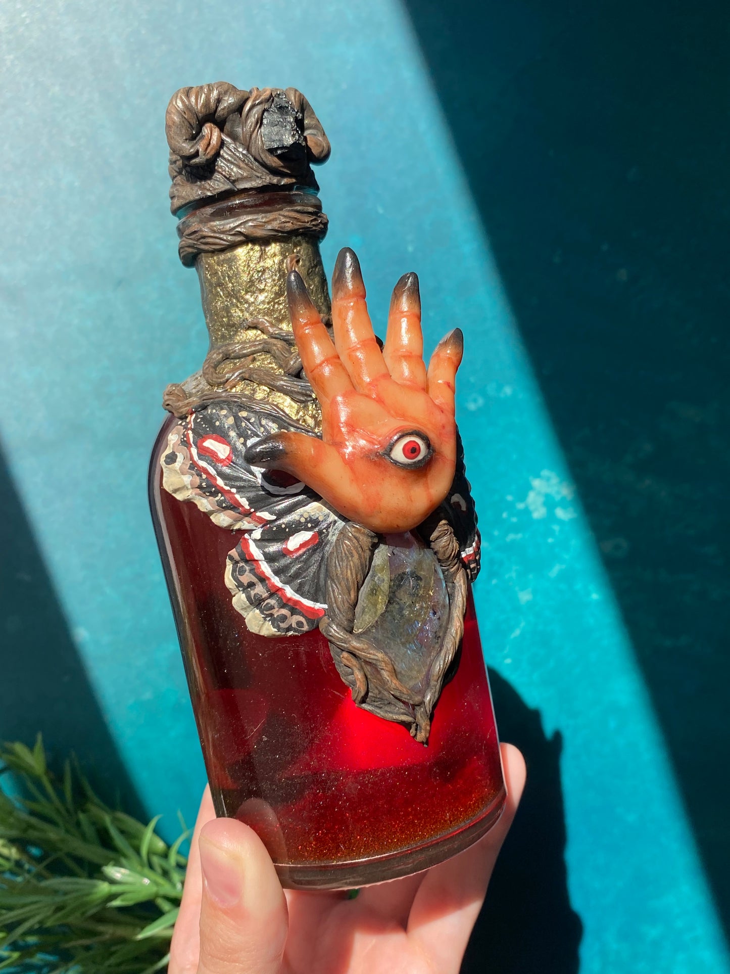 Pans Labyrinth inspired hand sculpted Pale Man potion bottle